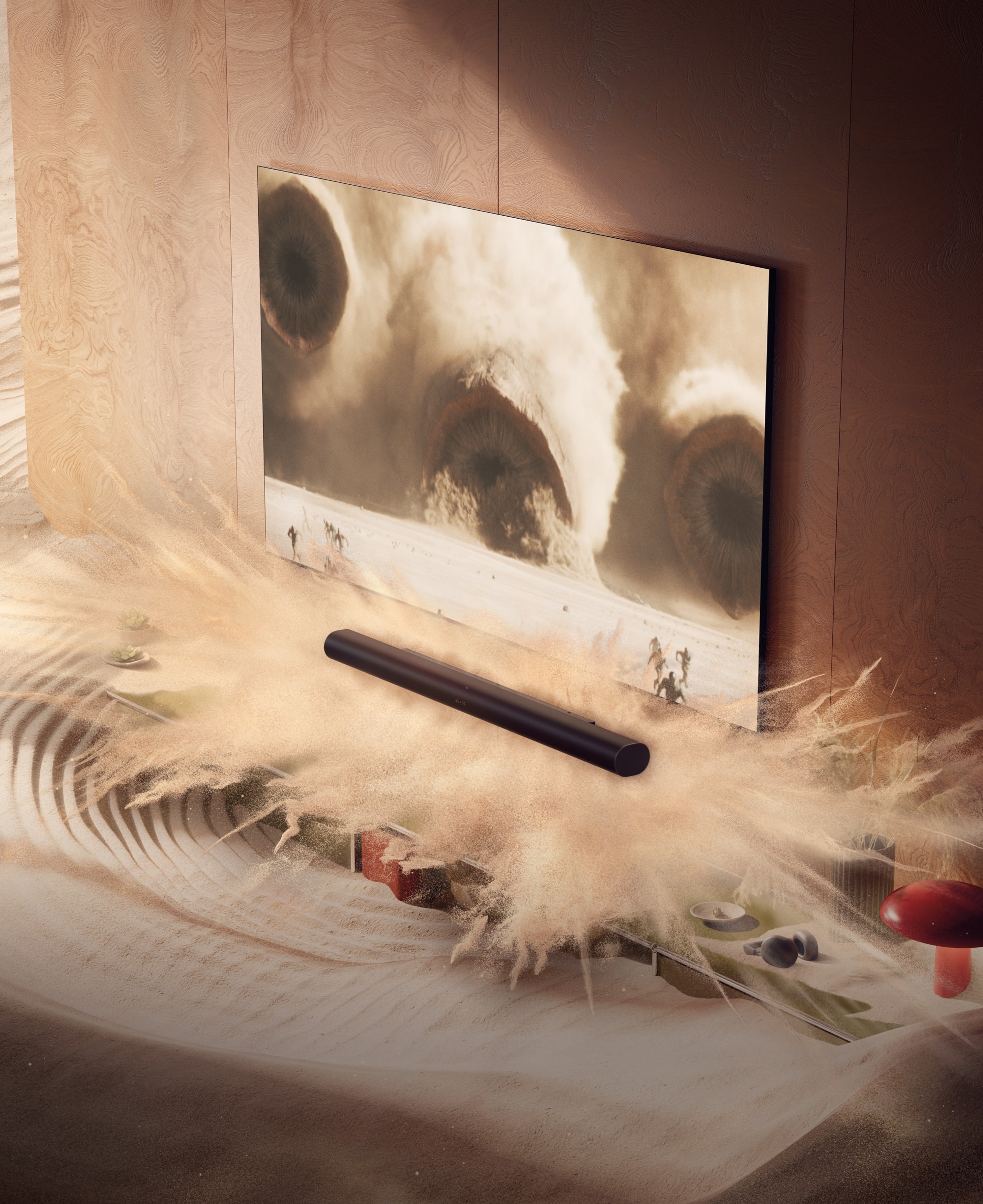 Arc Ultra in a living room with animated sand and screen content from Dune 2