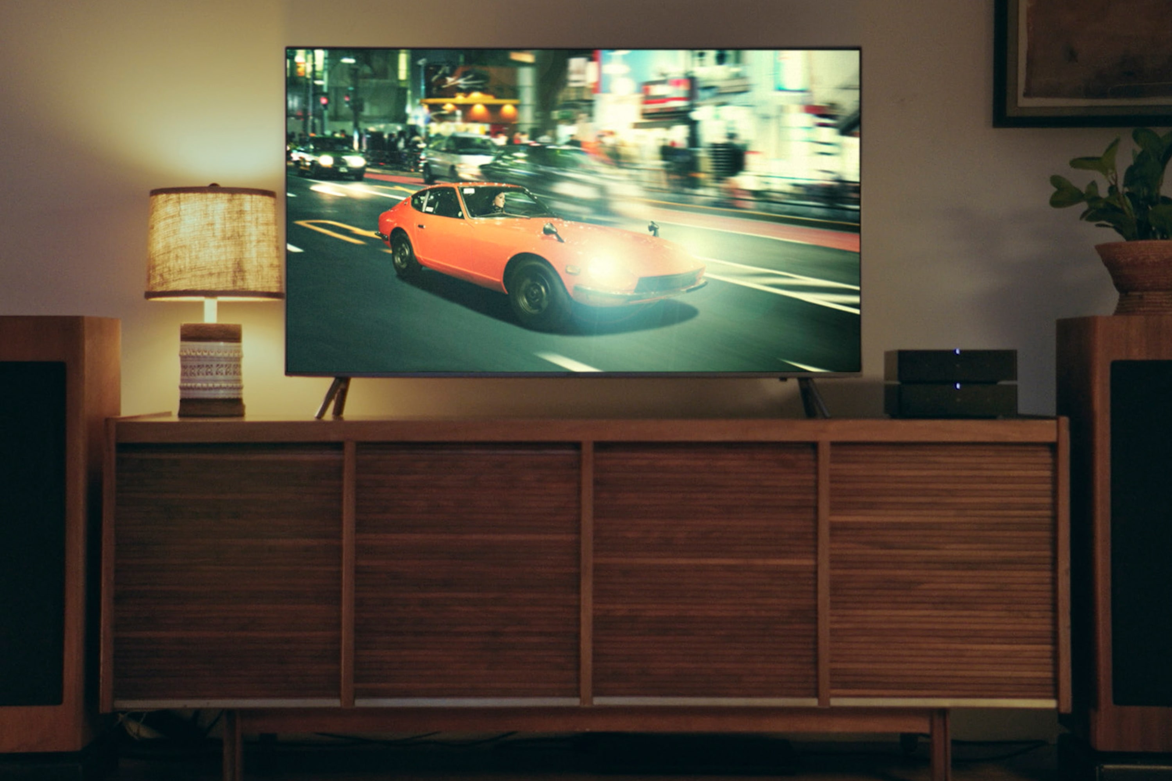 TV setup with Sonos Amp on media console