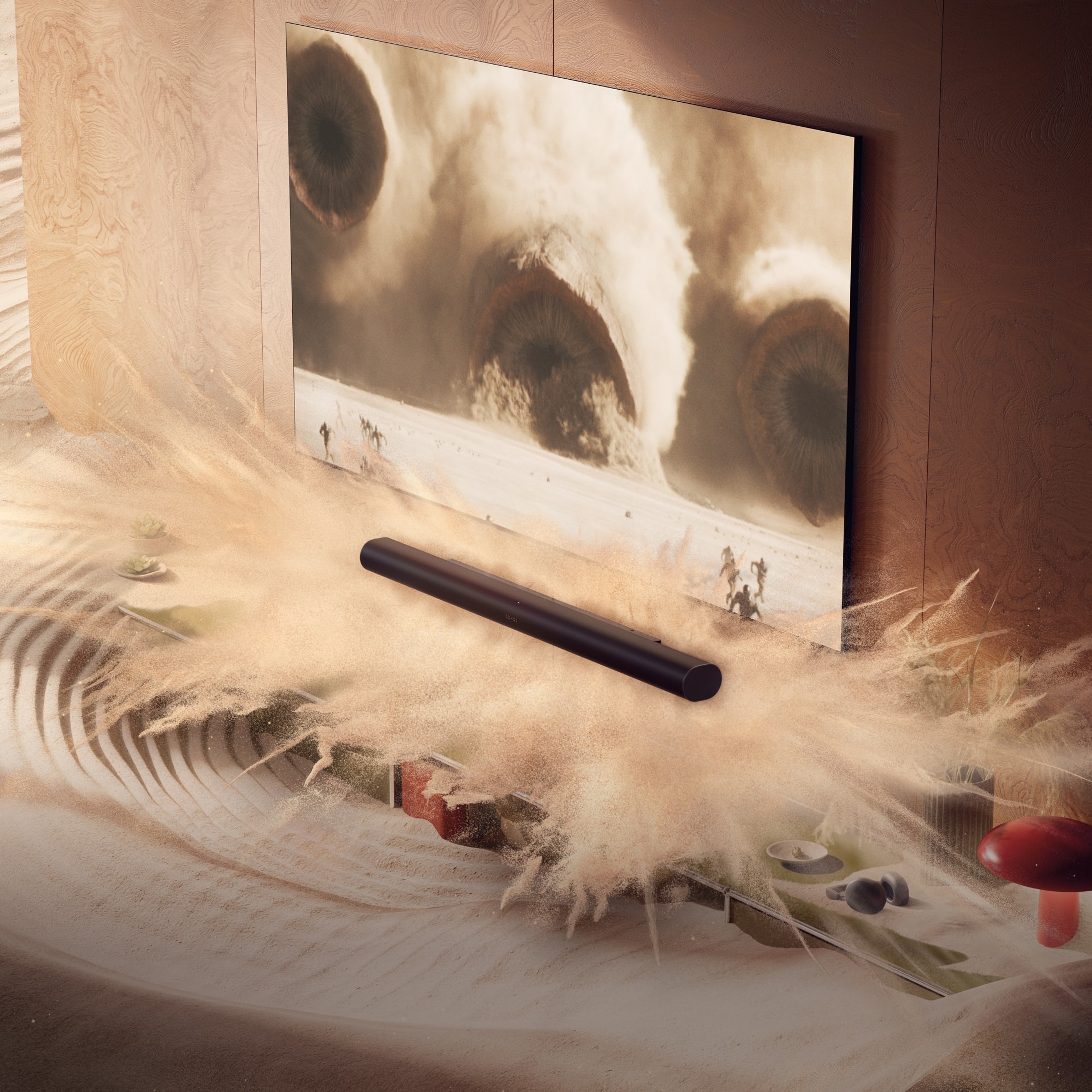 Arc Ultra in a living room with animated sand and screen content from Dune 2